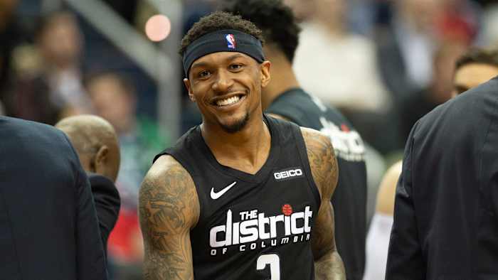 Wizards guard Bradley Beal smiles wearing a black jersey