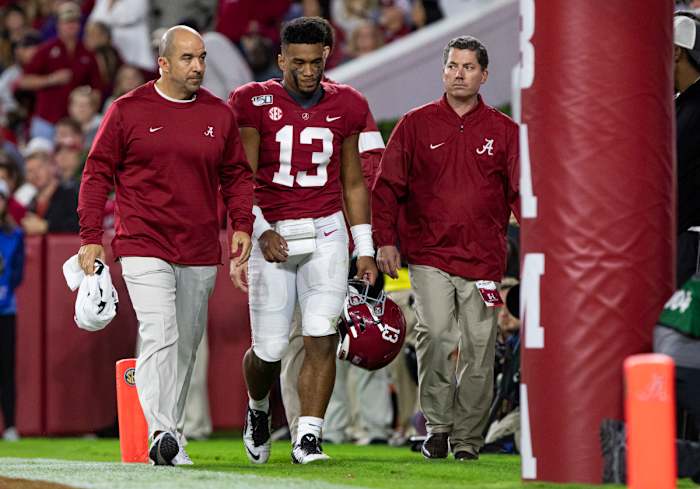 Tua Tagovailoa heads to the locker room against Tennessee