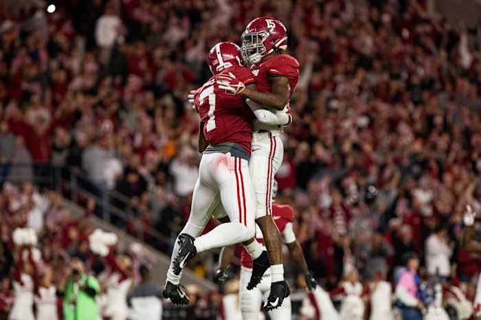 Trevon Diggs and Xavier McKinney celebrate against Tennessee