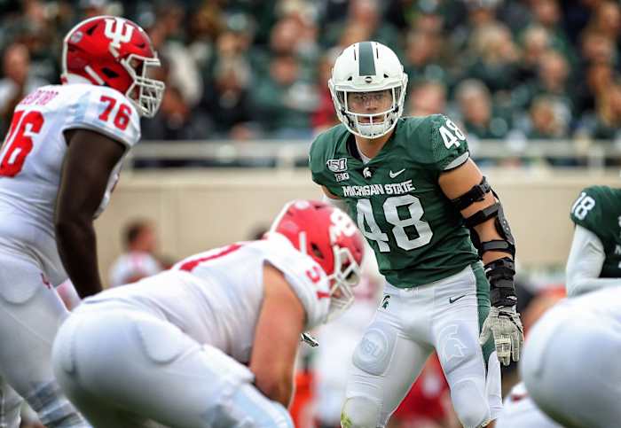 Indiana left tackle Matt Bedford (76) and left guard Harry Crider (57) await the snap against Michigan higan State defensive end Kenny Willekes (48). Mike Carter-USA TODAY Sports