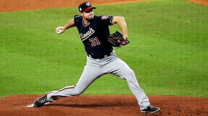 Oct 22, 2019; Houston, TX, USA; Washington Nationals starting pitcher Max Scherzer (31) throws against the Houston Astros during the first inning of game one of the 2019 World Series at Minute Maid Park. Mandatory Credit: Troy Taormina-USA TODAY Sports