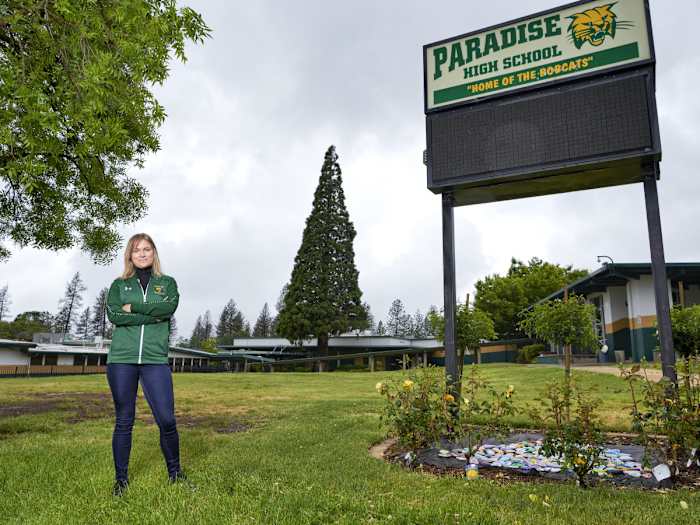 Annie Stearns stands in front of Paradise High School.