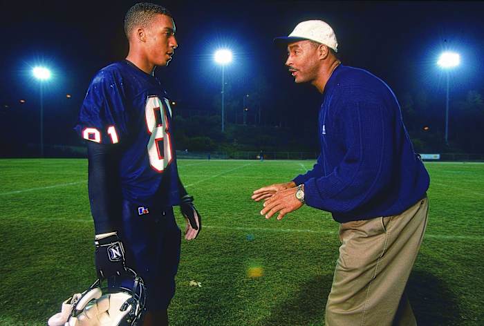 Father and son, in 1999, when Junior was in high school.