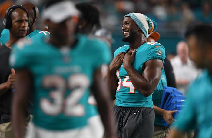 robert-quinn-sideline-dolphins.jpg