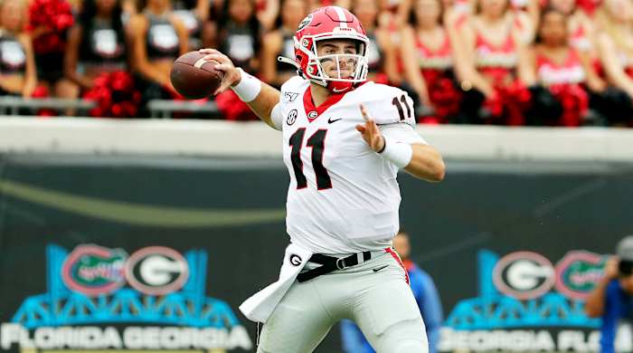 Nov 2, 2019; Jacksonville, FL, USA; Georgia Bulldogs quarterback Jake Fromm (11) throws the ball against the Florida Gators during the first half at TIAA Bank Field. Mandatory Credit: Kim Klement-USA TODAY Sports
