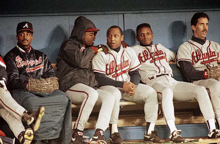 Teammates appreciated Sanders (in hoodie, massaging Terry Pendleton during an NLCS game), and his ability to keep things light.