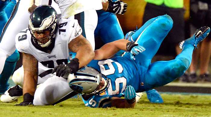 The aftermath of the collision between Brandon Brooks and Luke Kuechly that forced the latter from the game.