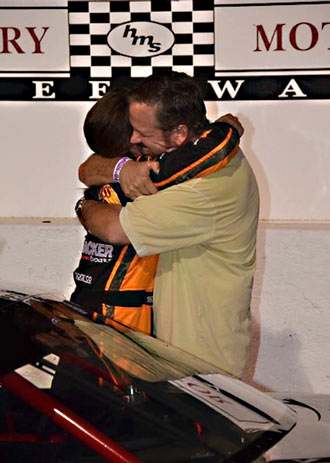 Kate and Wally share a victory hug.