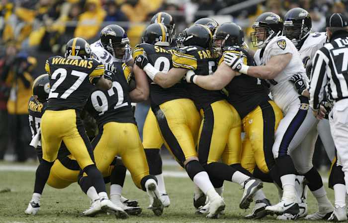 The Steelers D stuffs Jamal Lewis, December 2004. 