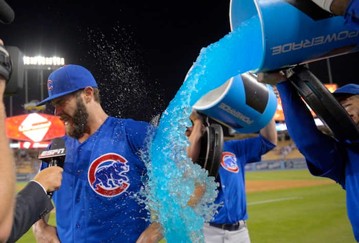 Arrieta gets a present from his teammates following his first career no-hitter.