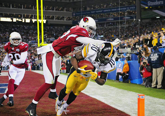 2009-0201-Super-Bowl-XLIII-Santonio-Holmes-Aaron-Francisco-opgm-51894.jpg