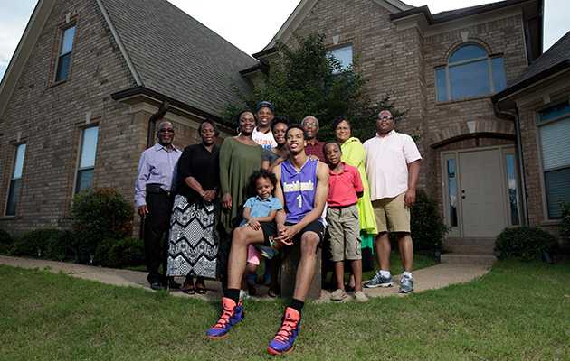 The foundation started by Gerald Hamilton (with glasses) has brought his family under scrutiny.