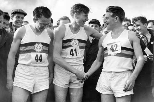 Chris Brasher, Roger Bannister and Chris Chataway celebrating after breaking the four-minute mile in 1954.