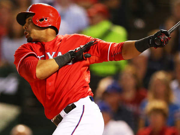 Nelson Cruz hit .266 with 27 homers and a .327 on-base percentage in his final year with Texas. (Ronald Martinez/Getty Images)
