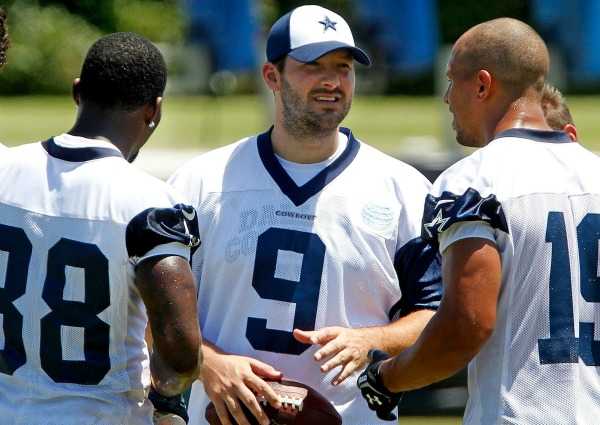 Tony Romo was limited to walk-throughs and light throwing after offseason surgery. (Getty Images)