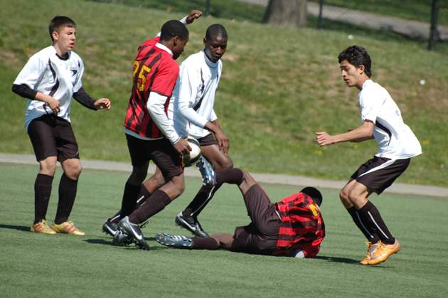 Bakary (center) and South Bronx United play against the Rosedale Rockets in the Icahn Stadium on Randall’s Island in 2012.
