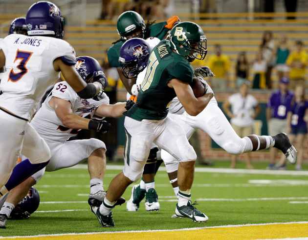 Nacita (31) fights his way into the end zone for a score late in the second half of a Baylor-Northwestern State game in September.