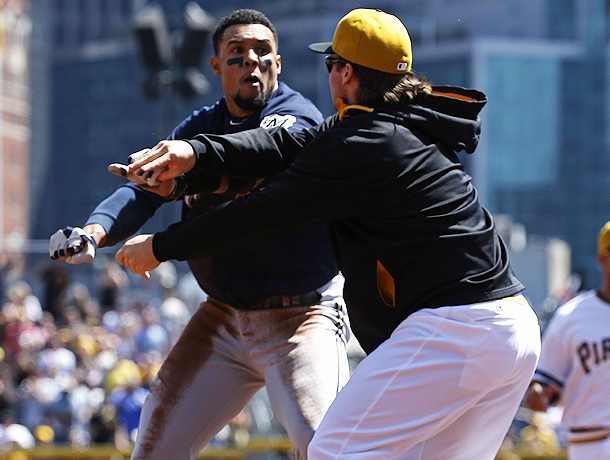 Carlos Gomez (left) and Travis Snider traded blows after Gomez admired a non-homer. (Gene J. Puskar/AP)