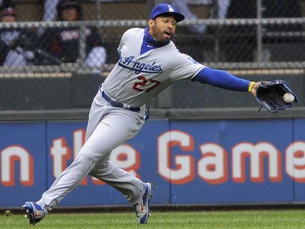 Matt Kemp has spent the last five games on the bench for the Dodgers. (Tom Olmscheid/AP)