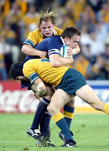 To emphasize shoulder tackling, there are Rugby clips sprinkled in throughout the video.(Christophe Simon/AFP/Getty Images)