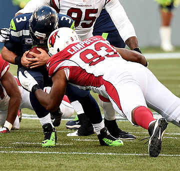 Calais Campbell and the Cards are allowing a 82.2 rating to opposing QBs, sixth-best in the NFL. (Steve Dykes/Getty Images)
