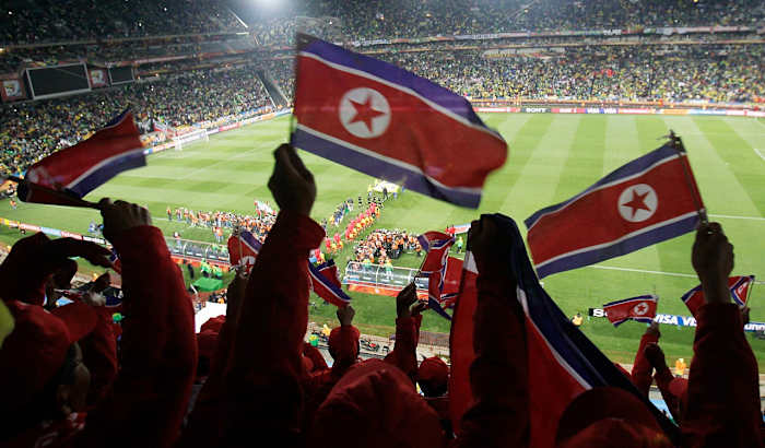 2010-north-korea-walking-onto-pitch.jpg