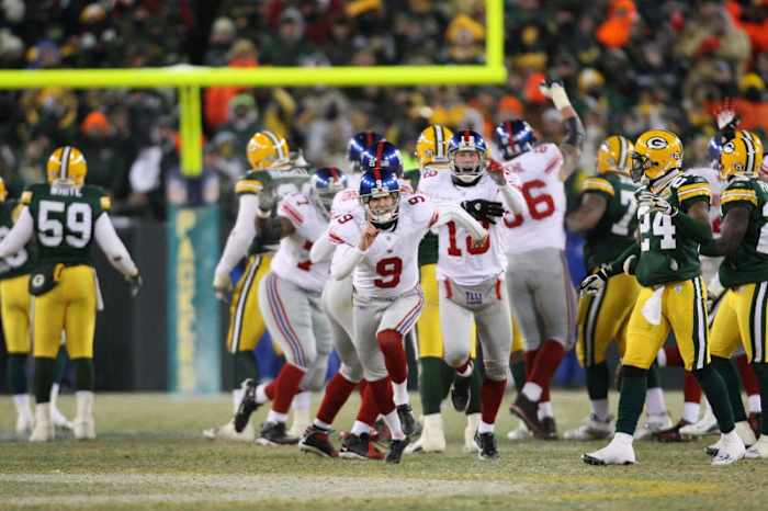 Tynes’ 47-yard game-winner in sub-zero temps at Lambeau earned New York a trip to Super Bowl 42, where they upset the Patriots. (Simon Bruty/Sports Illustrated)