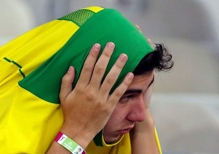 distraught-brazil-fan-c1ce29ebd2e74bf287272224dd5fda54-0.jpg