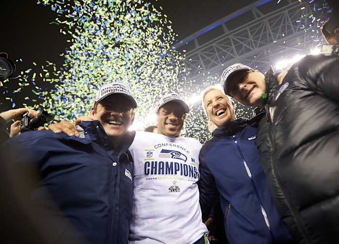 2014-0119-Russell-Wilson-Peter-McLoughlin-Pete-Carroll-Paul-Allen-X157457_TK1_2939.jpg