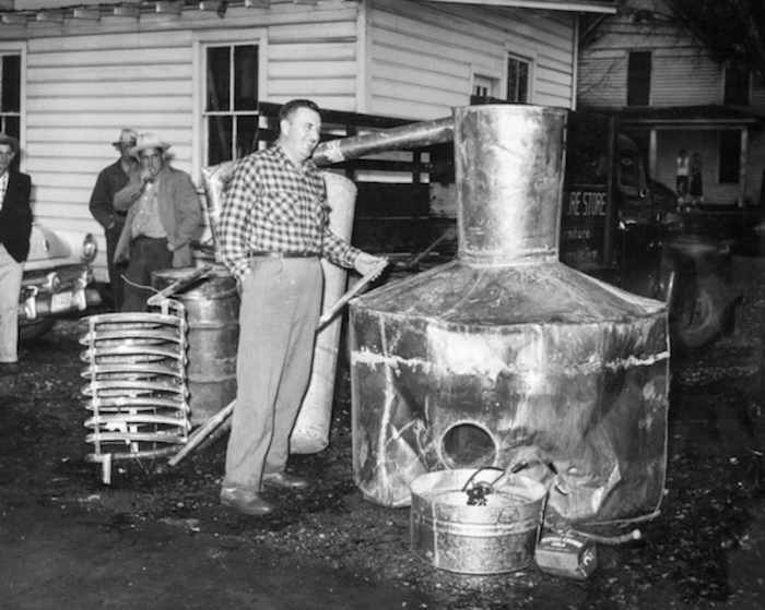 A moonshine still, shot in black and white to make it look old time-y.