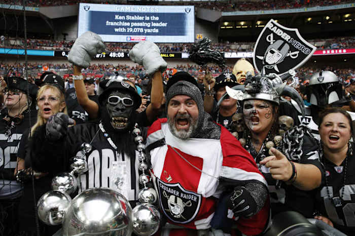 Cultures clashed in good fun in the stands at Wembley, but sporting differences between U.S. and U.K. sports run deep. (Lefteris Pitarakis/AP)