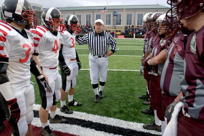 Easton and Phillipsburg captains met before the 2006 Thanksgiving game, the 100th anniversary of the rivalry. (Peter Turnley for Sports Illustrated)