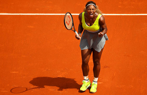 Serena Williams had no trouble advancing past Frenchwoman Alize Lim. (Clive Brunskill/Getty Images)
