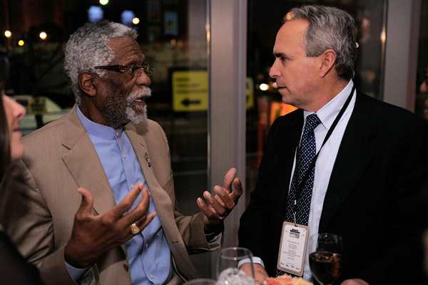 Ross Greenburg speaks with Bill Russell at SI's 2010 Sportsman of the Year party. (Jemal Countess/Getty Images)