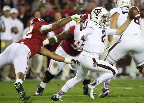 Johnny Manziel was suspended for signing autographs with his likeness on it. (Darren Rovell/ESPN)