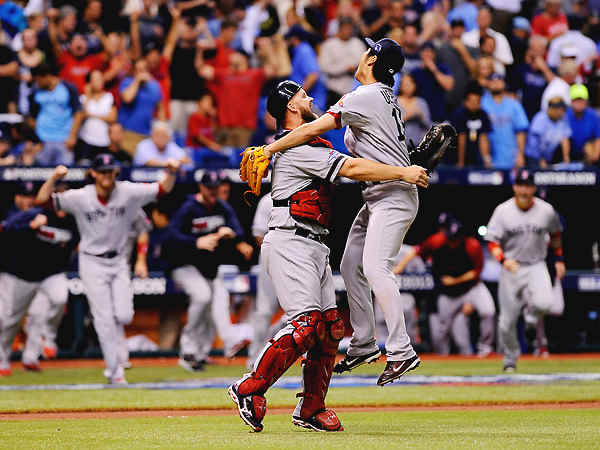 Koji Uehara recovered from surrendering a walkoff homer on Monday to log the save on Tuesday. (Brian Blanco/Getty Images)