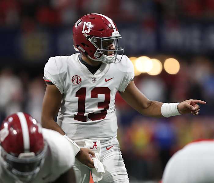 Alabama quarterback Tua Tagovailoa in white road uniform