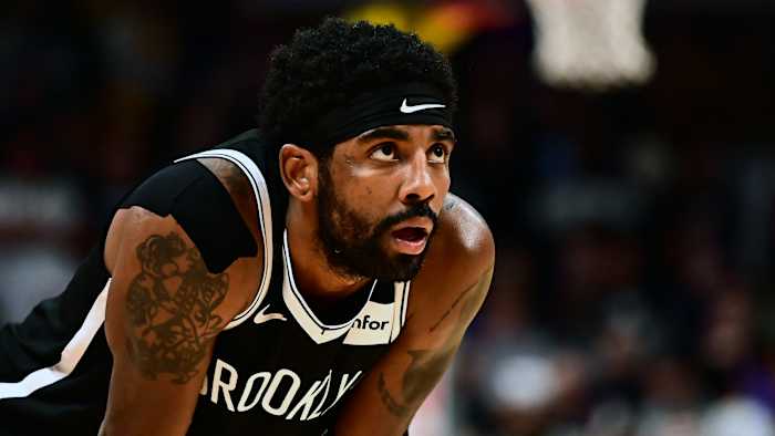 Kyrie Irving posted a message to Instagram after Boston fans heckled him despite his absence.