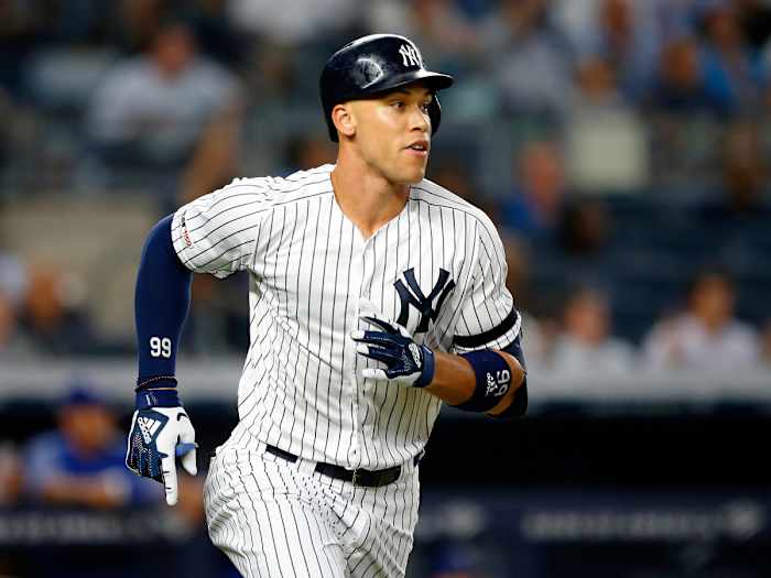 Sep 4, 2019; Bronx, NY, USA;  New York Yankees right fielder Aaron Judge (99) rounds the bases after hitting a home run in the third inning against the Texas Rangers at Yankee Stadium.