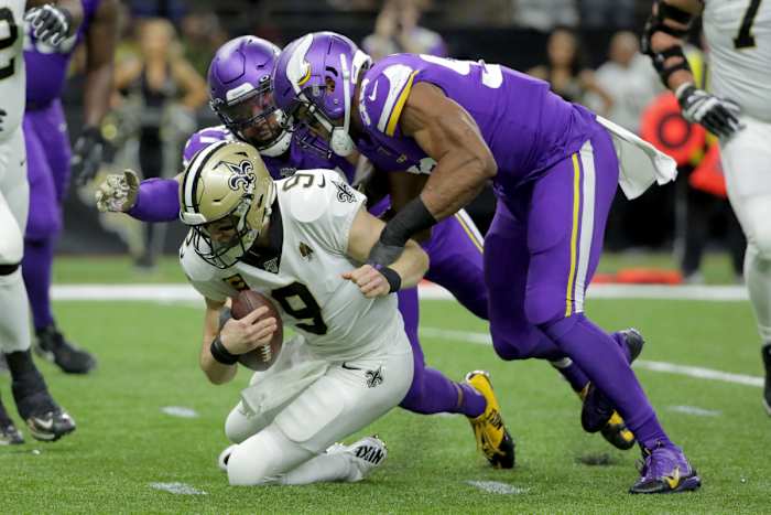 Jan 5, 2020; New Orleans, Louisiana, USA; Minnesota Vikings defensive end Everson Griffen (97) and defensive end Danielle Hunter (99) sack New Orleans Saints quarterback Drew Brees (9) during the first quarter of a NFC Wild Card playoff football game at the Mercedes-Benz Superdome. Mandatory Credit: Derick Hingle-USA TODAY Sports