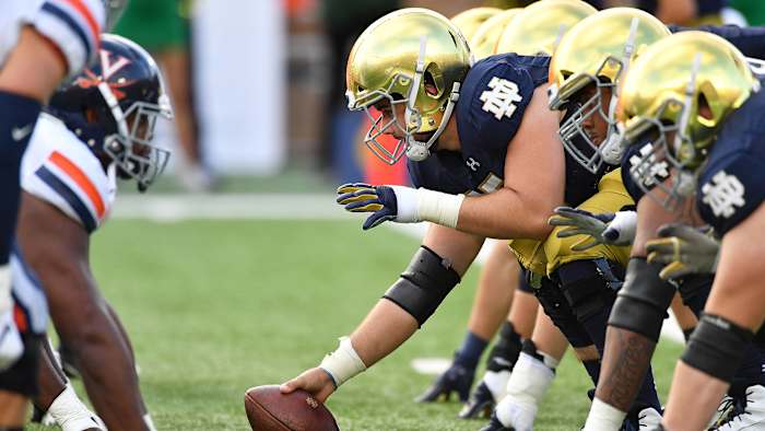 Notre Dame football lines up against Virginia