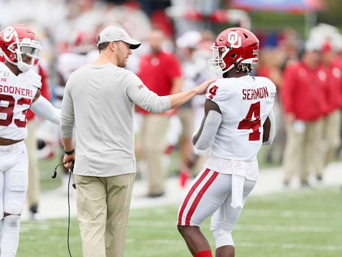 Oklahoma coach Lincoln Riley with Trey Sermon