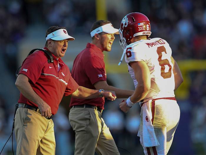 Bob Stoops, Lincoln Riley and Baker Mayfield in 2016