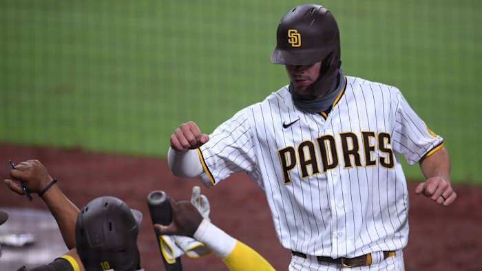 Wil Myers is greeted in the dugout after homering