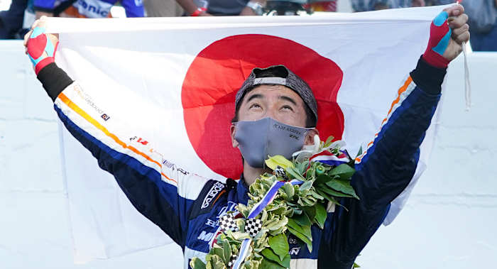 Indy Series driver Takuma Sato (30) reacts after winning the 104th Running of the Indianapolis 500 at Indianapolis Motor Speedway.