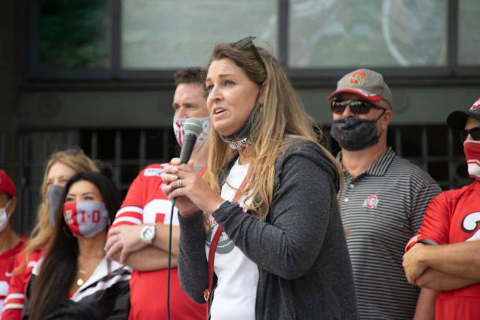 Amanda Babb addresses a crowd of more than 100 Ohio State football fans
