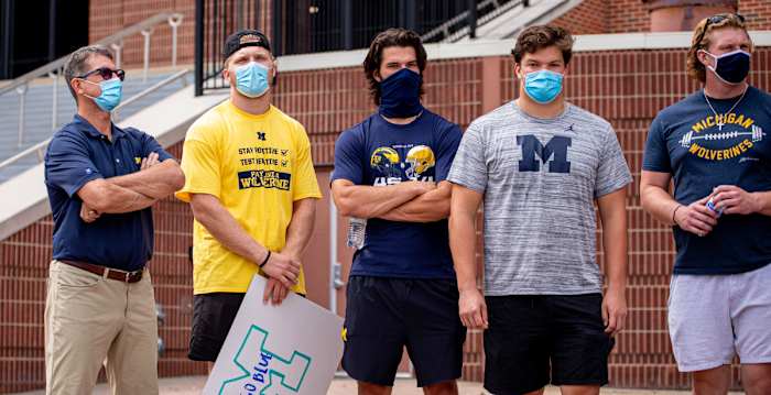 jim harbaugh aidan hutchinson dylan mccaffrey jess speight