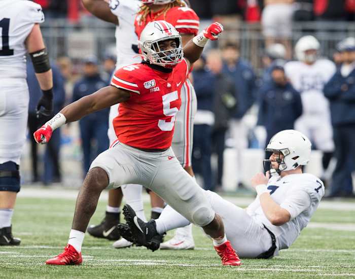 Baron Browning celebrates after a 2019 sack against Penn State.