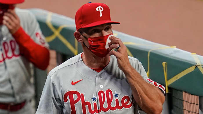 Philadelphia Phillies manager Joe Girardi (25) shown in the dugout against the Atlanta Braves during the seventh inning at Truist Park.