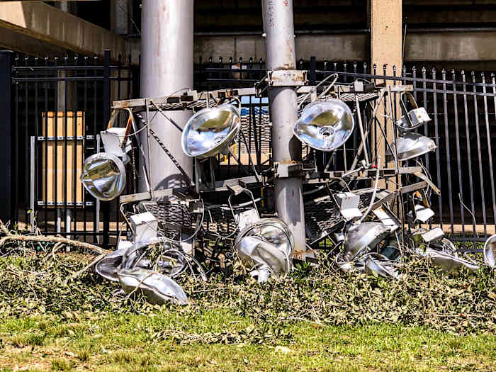 A crushed light fixture outside Cowboy Stadium
